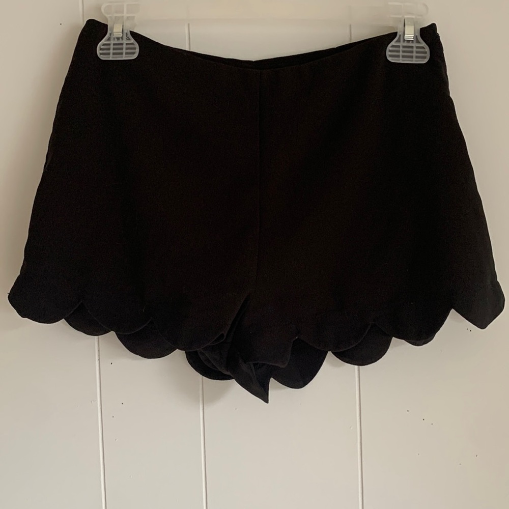 Size small scalloped shorts with the zipper on the side